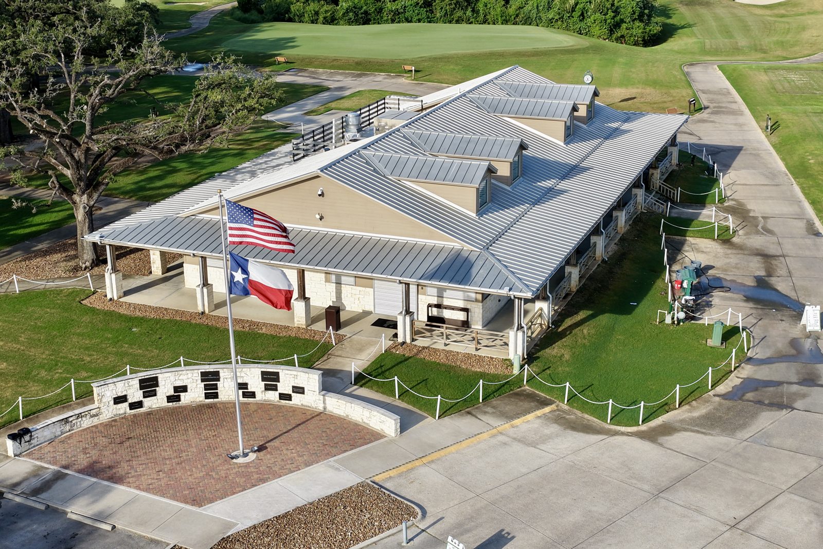 Golf clubhouse and flags from the air